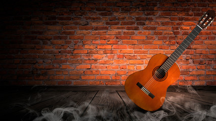 Guitar in a dark room with brick walls, wooden floor. Smoke, abstract light. Dark empty scene with...