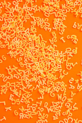 Obraz premium Pasta Alphabet (set of ingredients, raw pasta) serving second course. top food background. copy space