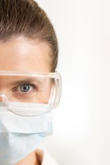 Close up of surgeon wearing mask in clinic