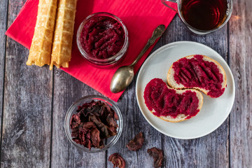 Sandwiches with natural, homemade beetroot jam, vanilla and sugar. Crispy Waffles. Healthy food, vegetarianism.