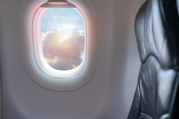 white clouds sunshine at height in sunny day from the passenger seat.