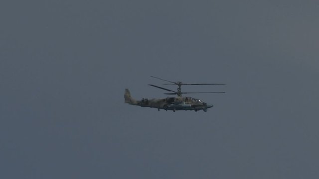 Russian military helicopter K-A 52 Alligator in the sky Stabilized image Ka-52 alligator Hokum B Russian reconnaissance and strike helicopter of the new