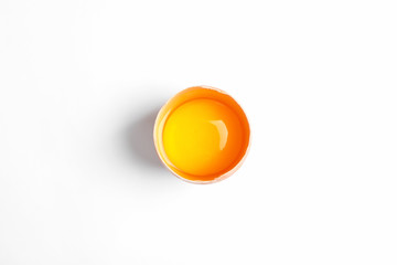 Egg yolk on white  background, space for text