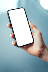 Close-up image of female hands using smartphone at the office. Human resources, management or social networks concept - Image