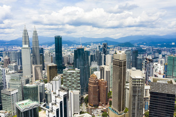Arial view of the Kuala Lumpur skyline during a cloudy day. Kuala Lumpur commonly known as KL, is the national capital and largest city in Malaysia.