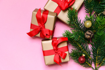 gift boxes with red bows, gift for New Year and Christmas. isolate on pink background copy space. layout