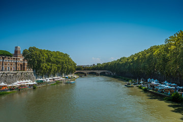 Fototapeta na wymiar Beautiful view of the river Tiber with the Umberto I bridge in the background in Rome, Italy