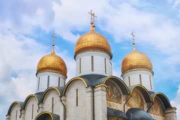 Fototapeta na wymiar Assumption Cathedral - an Orthodox church of the Moscow Kremlin located on Cathedral Square, is included in the State Historical and Cultural Museum-Reserve - the Kremlin, Moscow, Russia in June 2019