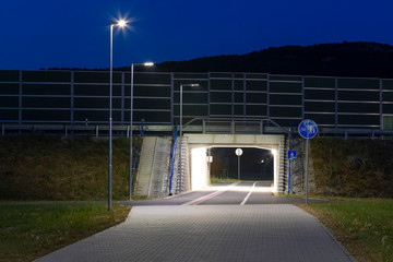 Fototapeta na wymiar safety underpass fro pedestrians and bikers at night