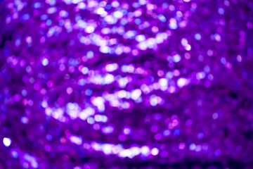 Glitter lights abstract background. Disfocused bokeh