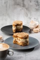 Banana or nut cake on gray plate on marble background. Selective focus. Vertical photo. Menu for bakery. cafe menu. Pastry. Delicious and sweet dessert at cafe restaurant.
