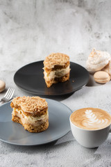 Banana or nut cake on gray plate on marble background. Selective focus. Vertical photo. Menu for bakery. cafe menu. Pastry. Delicious and sweet dessert at cafe restaurant.
