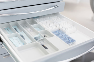 Close up of drill needles in open drawer