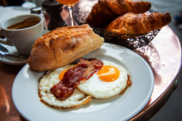 Egg and Toast - classical english breakfast with egg and ham