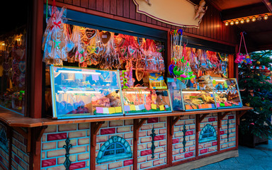 Gingerbread cookies of Christmas market of Germany in Europe in winter. German Night street Xmas...