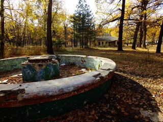 ruins of an old children's camp in the woods