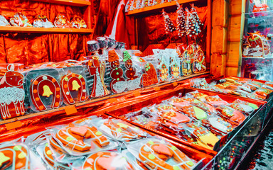 Gingerbreed sweet food stall in Christmas market in Riga in Latvia in winter.