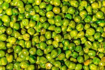 Pile green peas flat background