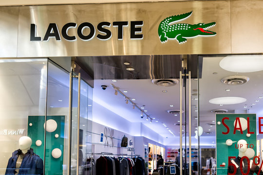 Tysons, USA - January 26, 2018: Lacoste store sign entrance shop alligator logo Tyson's Corner Mall in Virginia by Mclean Stock Photo | Adobe Stock