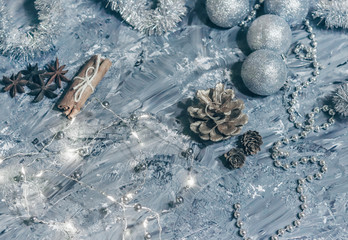 Christmas decorations on a gray background with luminous lights