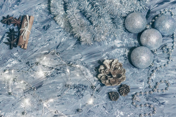 Christmas decorations on a gray background with luminous lights