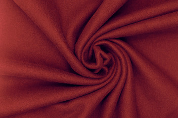 Crumpled fleece fabric texture, dark brown.