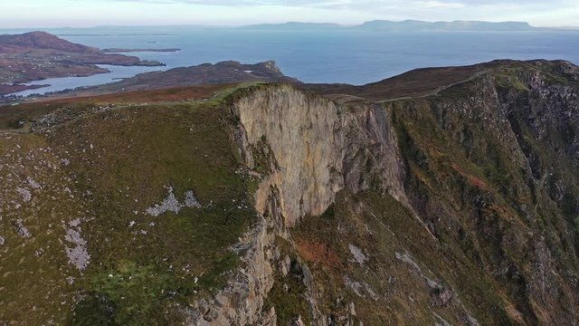 Aerial of Slieve League Cliffs are among the highest sea cliffs in Europe rising 1972 feet or 601 meters above the Atlantic Ocean - County Donegal, Ireland