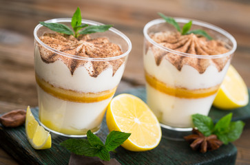Lemon tiramisu dessert with cocoa and mint