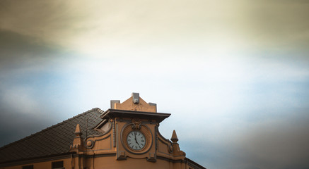 Outdoor analog clock on historical Buildings for city construction. Set of elements to create urban background, village and town landscape.Timeless concept idea with copyspace