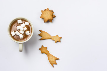 Cup of Hot Tasty Chocolate with Marshmallows on a Blue Background Three Gingerbread Cookies Top View Festive Flat Lay Copy Space