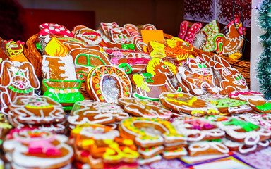 Colorful icing on the handmade gingerbreads displayed at the Christmas market in Riga, Latvia. Traditional sweets presented in various shapes, sizes and styles such as horse, cat and Santa.