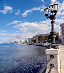 Fototapeta na wymiar Panorama of the Italian city of Bari, promenade, lights, observation wheel, spring. Traveling in Italy, tourism