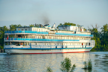 Cruise liner with tourists passes through the Volga-Don Shipping Canal named after Lenin....