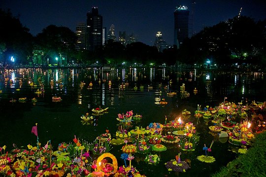Bangkok, Thailand, November 11, 2019. Loy Krathong festival. Offerings made by Thai people floating in the lagoon in Lumpini Park