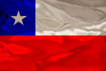 photo of the beautiful colored national flag of the modern state of Chile on textured fabric, concept of tourism, economics and politics, close-up
