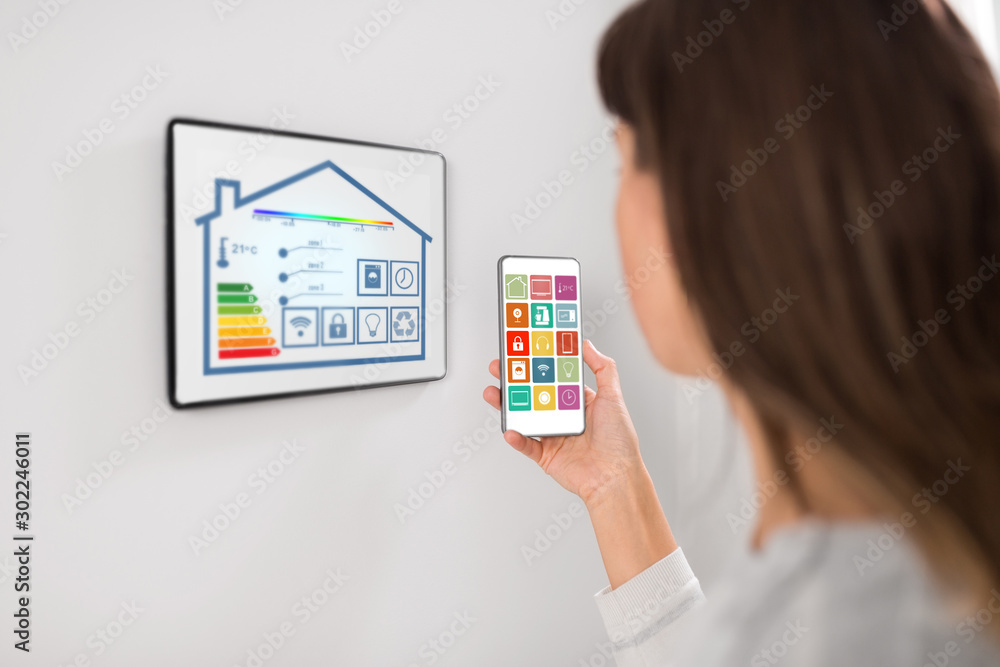 Poster automation, internet of things and technology concept - woman using tablet pc computer and smartphon