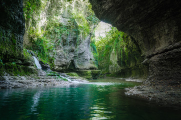 river and stream in the mountains with green plants in Georgia