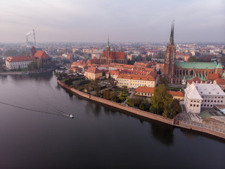 Fototapeta premium The aerial view of Wroclaw: Ostrow Tumski, Cathedral of St. John the Baptist and Collegiate Church of the Holy Cross and St. Bartholomew