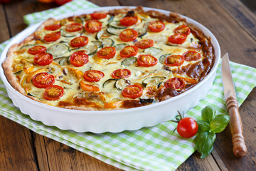 Quiche with tomatoes, spinach and feta cheese
