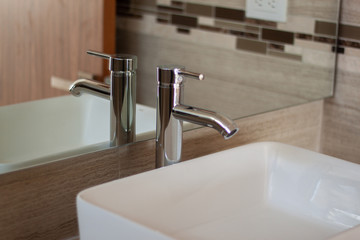 Bathroom interior, water tap and mirror