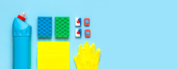 House cleaning concept. Household chemicals, disinfectant, bleach, antibacterial gel, yellow rubber...
