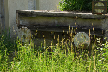 abandoned railway dead end, lost place railroad station with rusty railway dead end as a sign of...