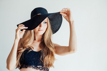 beautiful girl in a hat with a brim fashion