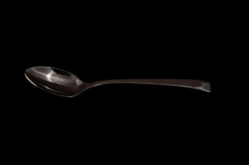 Spoon isolated on a black background