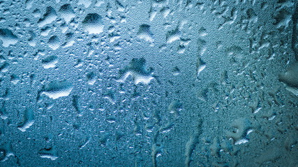 Water drops on glass for background and design