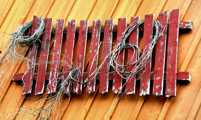 Picked Fence on Wooden Wall
