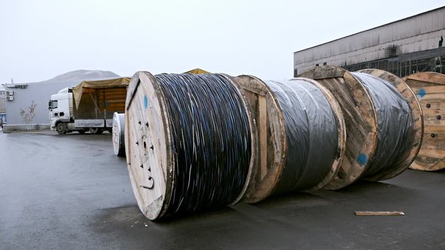 The manufacture of ropes. A bunch of ropes. High voltage cable reel.Electrical Pole to Wire Roll Pull Focus