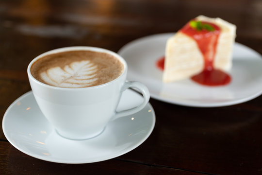 Coffee cup with Cake , image use for charge your energy in the morning