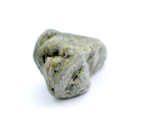 stone from the beach pictured in studio on white background