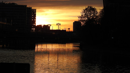 Sunrise on the river, urban landscape